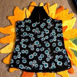Blue floral design on black background tank top.